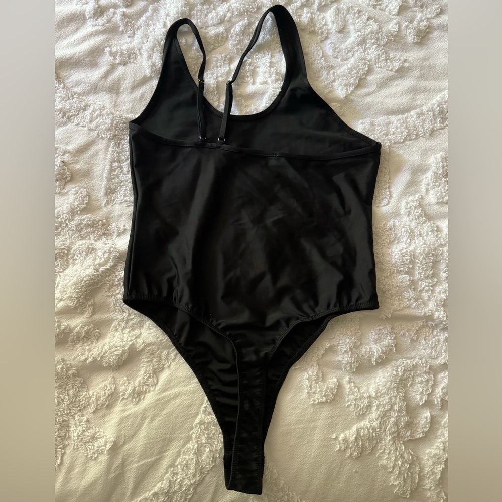 We Wore What Ladies Black Bodysuit  High Cut Thong Style Back Slanted Shoulder